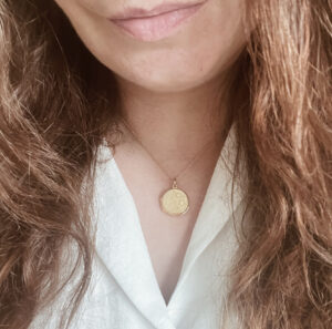 Gold photo necklace