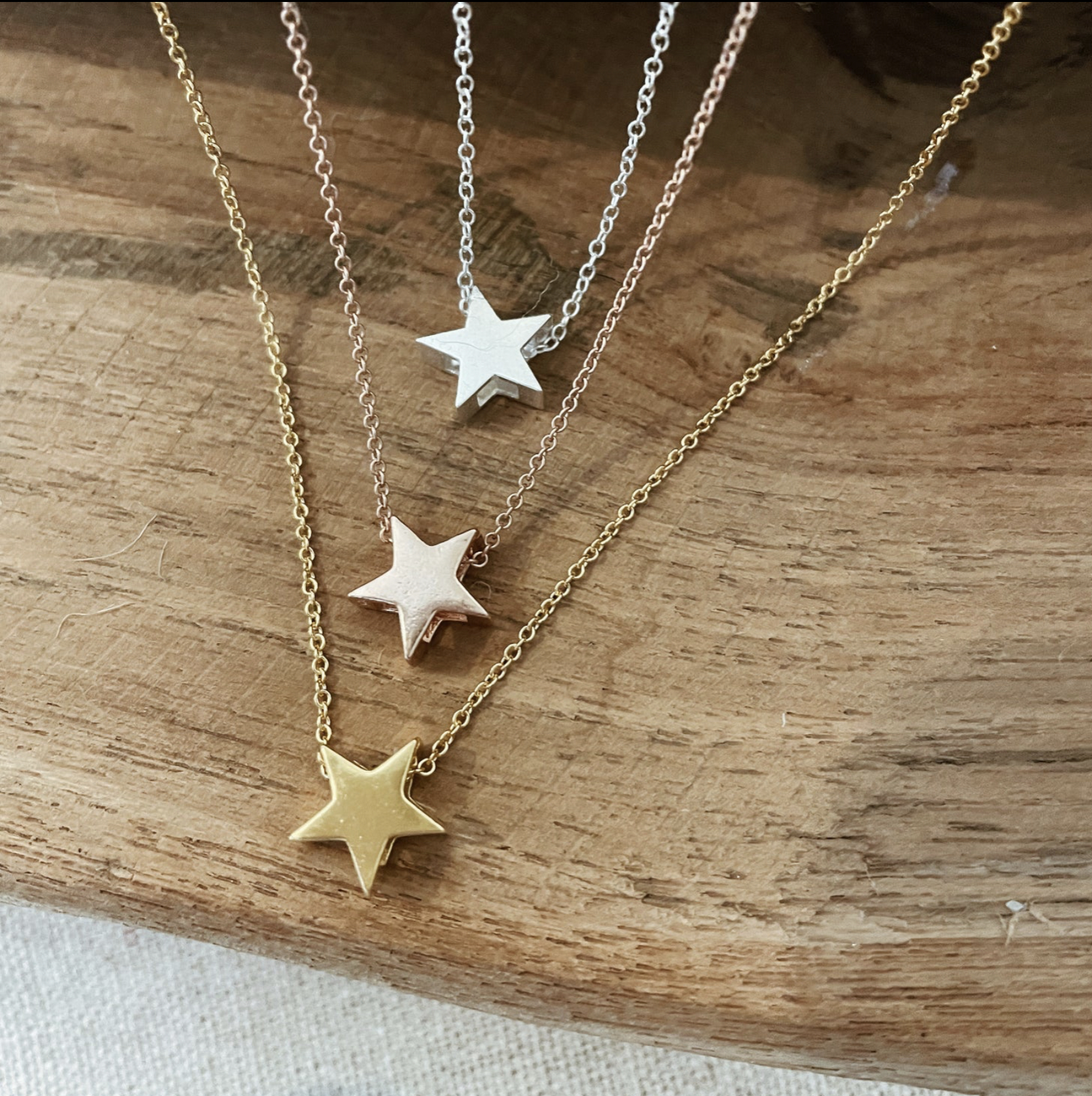 B0C316E7-0D06-4A48-9410-C8B299387134 Floating star necklace
