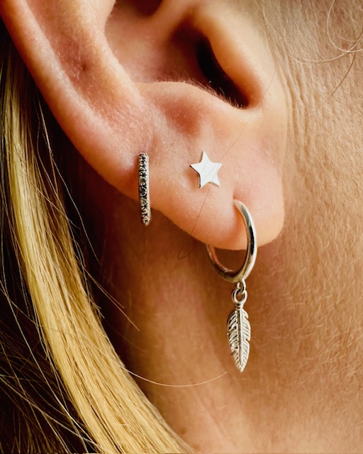 Star studs and feather huggie earrings 7